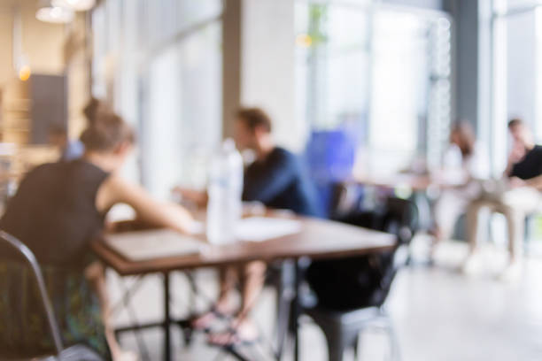 istock blur image background of office or co working space with people 1013457972