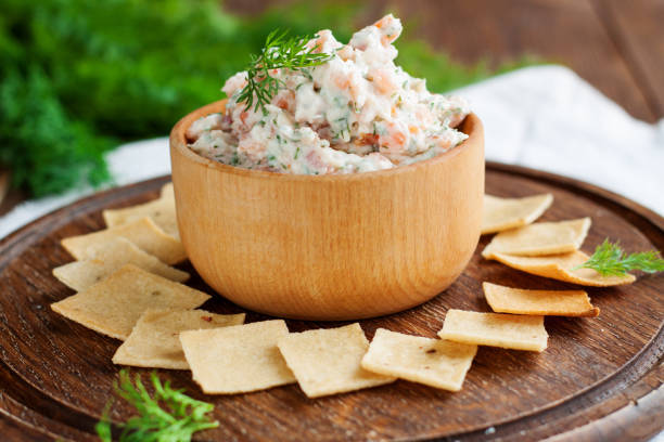 istock Smoked salmon and cream cheese dip with crackers 1013458636