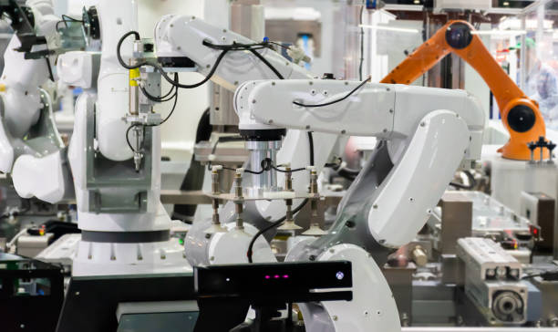 istock Robot Industrial 4.0 of things technology robot arm and man using controller for control 1013497164
