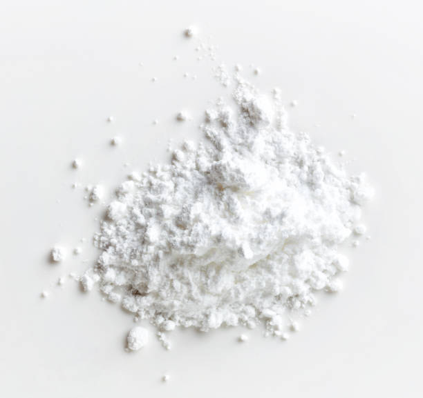 istock Heap of powder sugar on white background, from above 1013501742