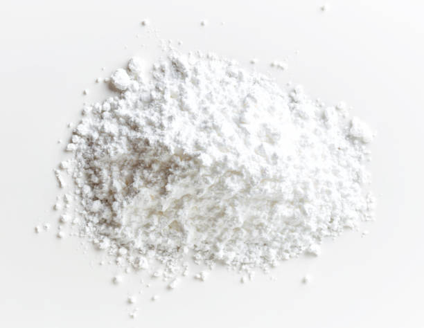 istock Heap of powder sugar on white background, from above 1013501764