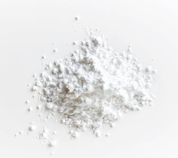 istock Heap of powder sugar on white background, from above 1013501770