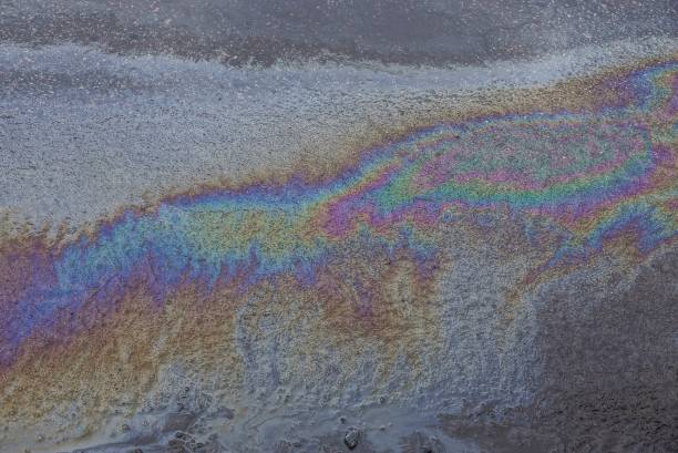 istock large colored oil stain on the asphalt 1013502032