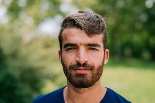 istock Portrait of handsome Middle Eastern man on summer day 1013507076