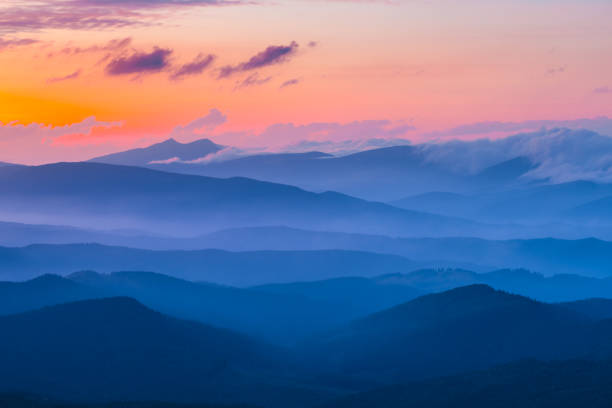istock mountain ridge landscape in a dense blue mist at the dawn 1013515436