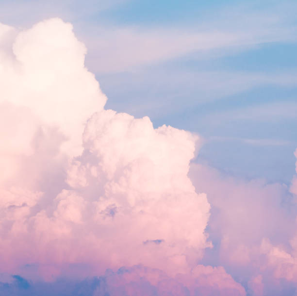 istock Clouds in the sky before sunset. Neon and blue trend colors. 1013518216