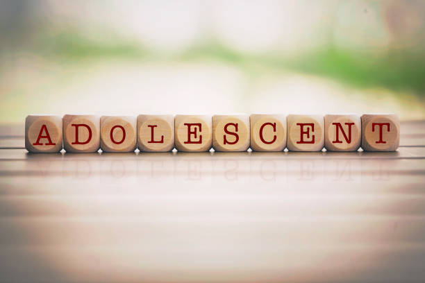 istock Adolescent word written on cube wooden blocks. 1013521010