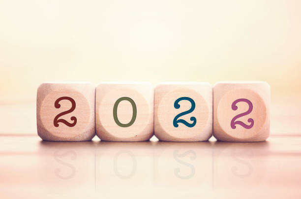 istock 2022 written on cube wooden blocks. 1013521118