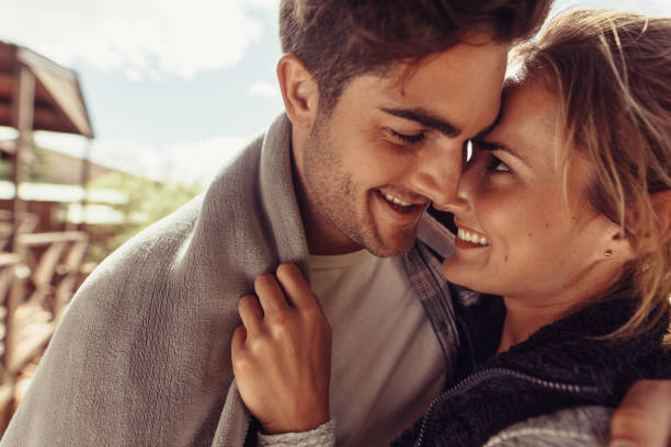 istock Affectionate couple on winter holiday 1013532882