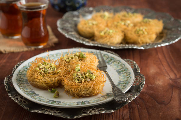 istock kataifi/kadayif pastry nest cookies with pistachios 1013533208