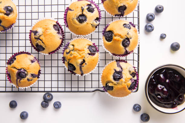 Ready-to-serve blueberry muffins with blueberry sauce