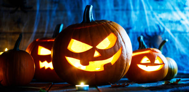 istock Halloween pumpkins and spiders 1013545262