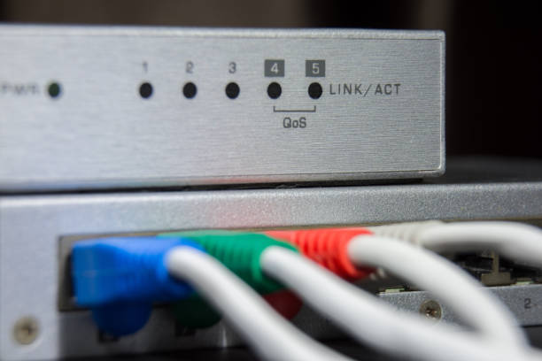 istock close-up of network hub and rj45 cables 1013545656