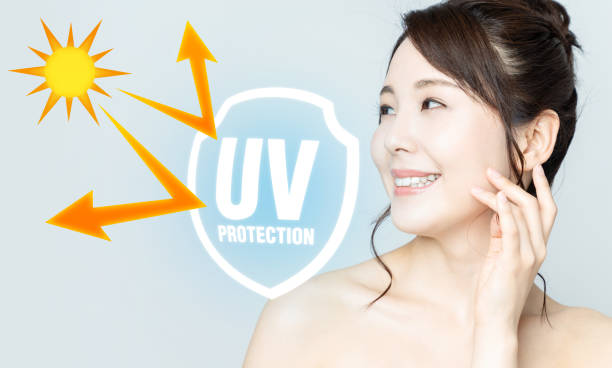 beautiful girl and sunscreen, UV protection. beautiful girl and sunscreen, UV protection. facilities protection services stock pictures, royalty-free photos & images