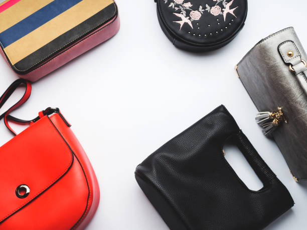 istock Woman's bags purses on white 1013559348