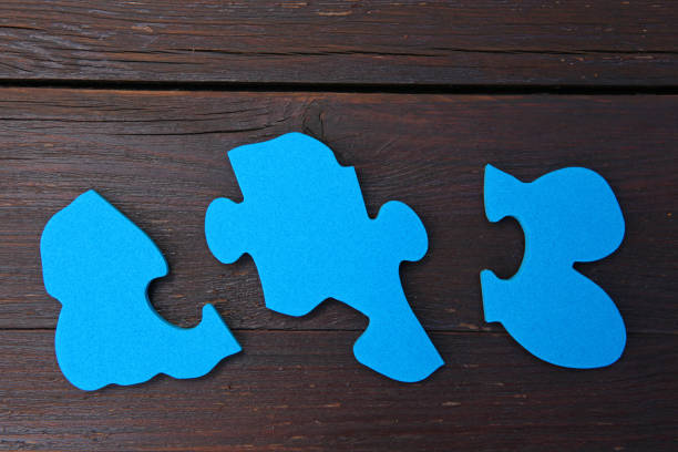 istock Baby puzzle wooden background 1013564492