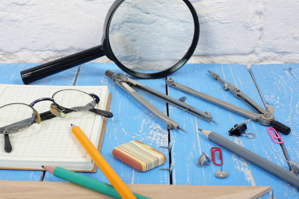 istock Science and education. Desktop scientist object on wooden background 1013571110