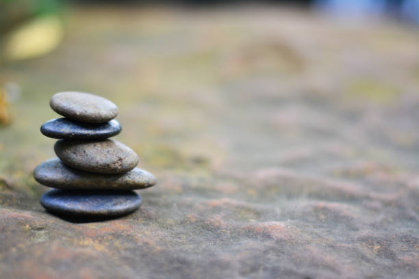 istock Balance zen stones on mountain rock right space position. 1013574034