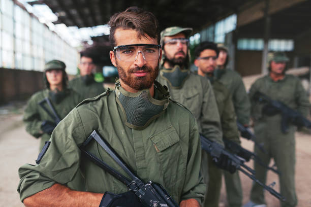 istock Middle Eastern leader with soldiers ready to attack 1013577082