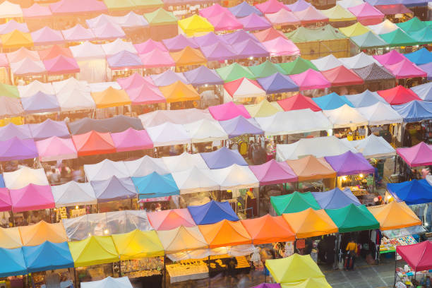 istock Multiple colour roof top flea market aerial view 1013577392
