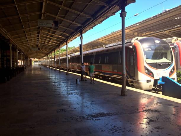 Sirkeci Train Station, Istanbul, Turkey - June 12, 2018: People are taking photos just beside the modern wagons in historical train station.
