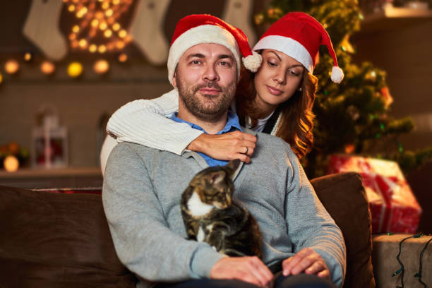 istock Smiling couple in Christmas time. 1013602144