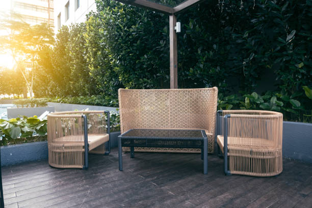 istock chairs and table side near the pool 1013602222