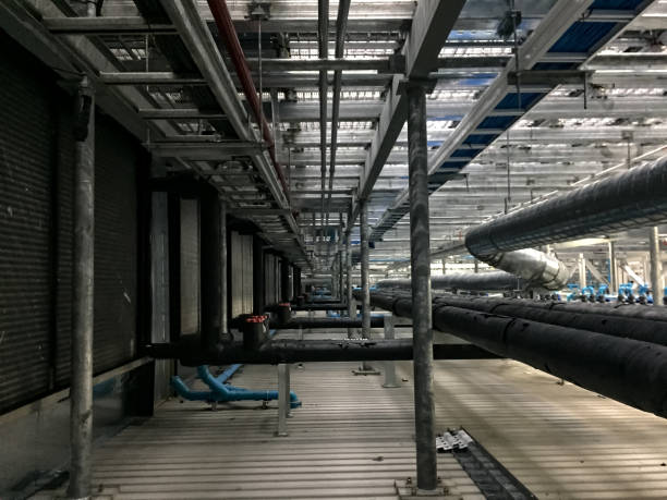 istock Pipe line and steel construction under raised floor. 1013610120