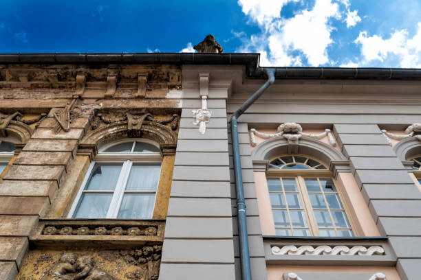 istock front of building with old and reconstructed part 1013610170