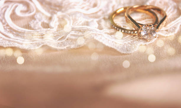 istock Wedding ring on the vintage lace 1013610862
