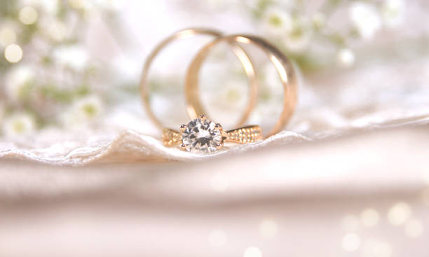 istock Wedding ring on the vintage lace 1013617230