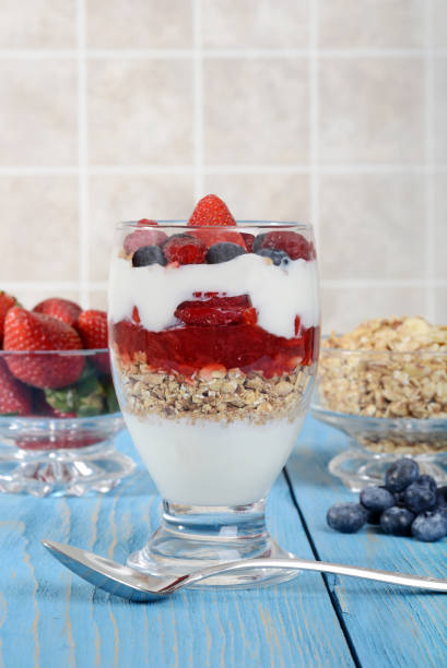 istock strawberry raspberry blueberry parfait with berries and granola 1013618046