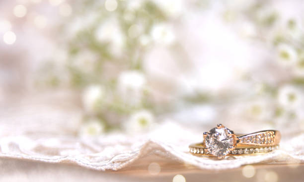 istock Wedding ring on the vintage lace 1013618068