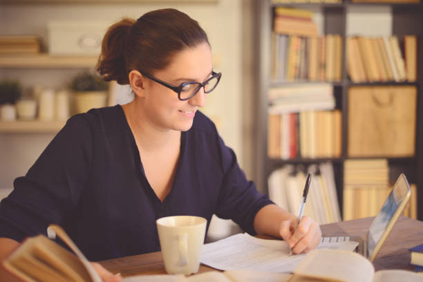 istock young woman working at home 1013628436