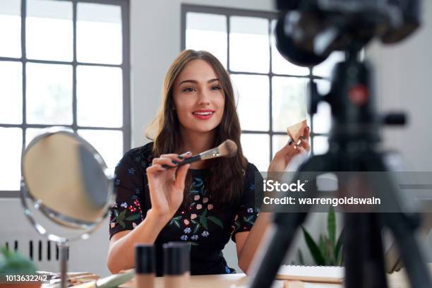 Pretty Young Vlogger Recording Make Up Tutorial Stock Photo - Download Image Now - Beauty, Influencer, Blogging