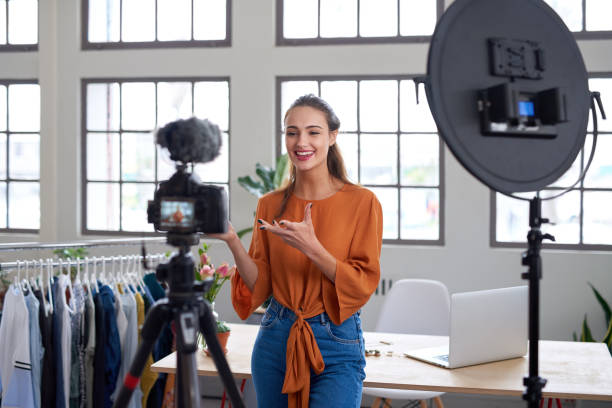 istock Social media influencer talking to camera for vlog 1013632320