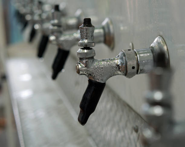 istock Beer taps with condensation in a row 1013632774