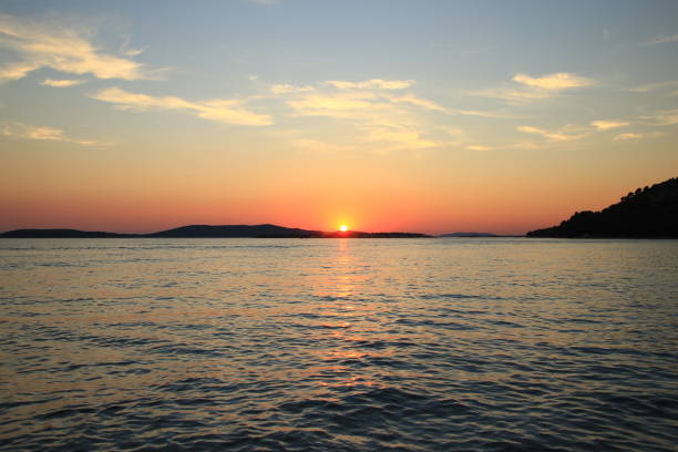 istock Sunset sky on Adriatic sea, Croatia 1013636230
