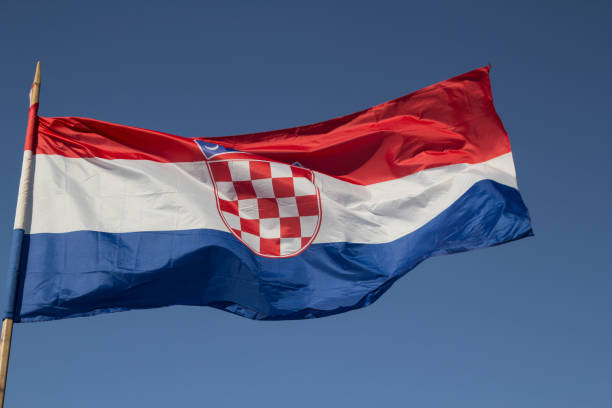 istock Flag of Croatia against the blue sky. 1013636800