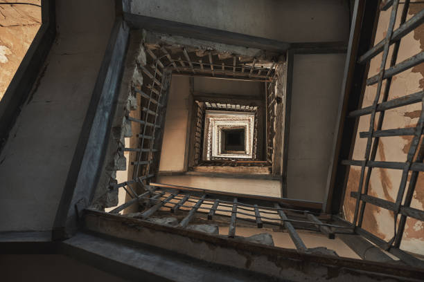 istock Antique old stairs in a building 1013647844