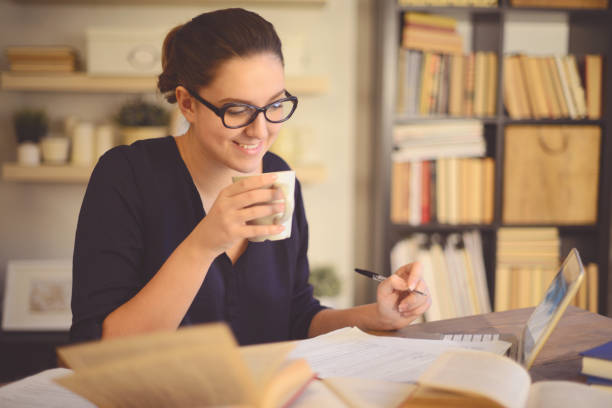 istock young woman working at home 1013652528