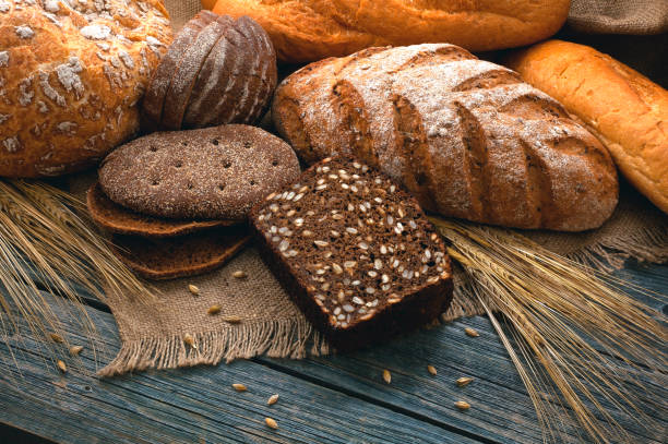 istock Bakery products on jute, wooden boards. 1013655100