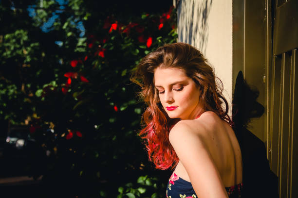 istock Model in front of flowers 1013661130