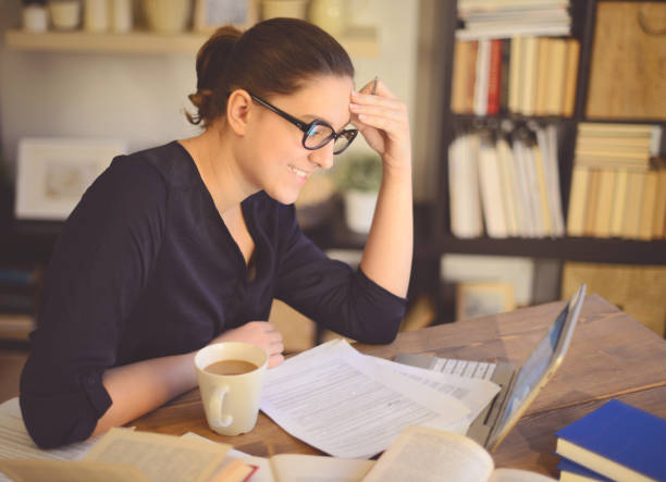 istock young woman working at home 1013668156