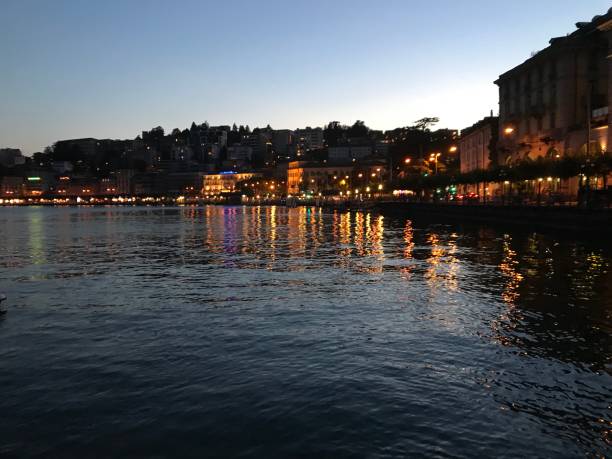 istock Reflection of lights into the Lugano lake 1013680618