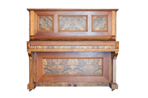 istock Vintage upright piano isolated on white background 1013680740
