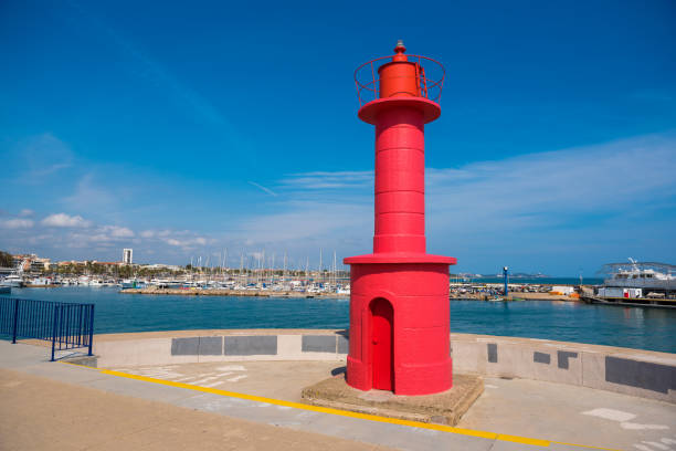 Red lighthouse in Cambrils, Catalunya, Spain. Copy space for text.