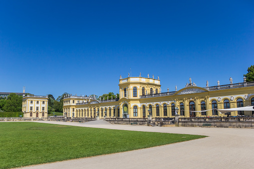 Kassel, Germany - May 08, 2018: Yellow castle in the Karlsaue park of Kassel, Germany