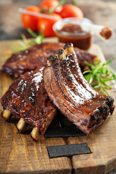istock Grilled and smoked ribs with barbeque sauce 1013694884