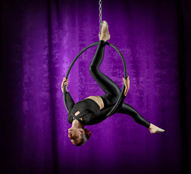 istock Woman doing gymnastic exercises on the hoop 1013698242